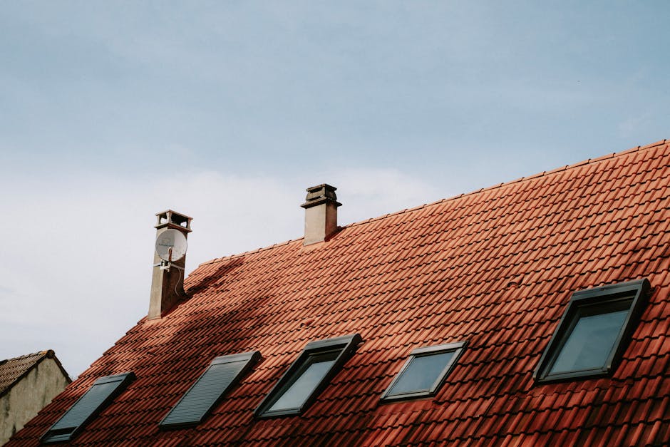 Whirlybird roof ventilator spinning on an Adelaide tile roof on a hot summer afternoon