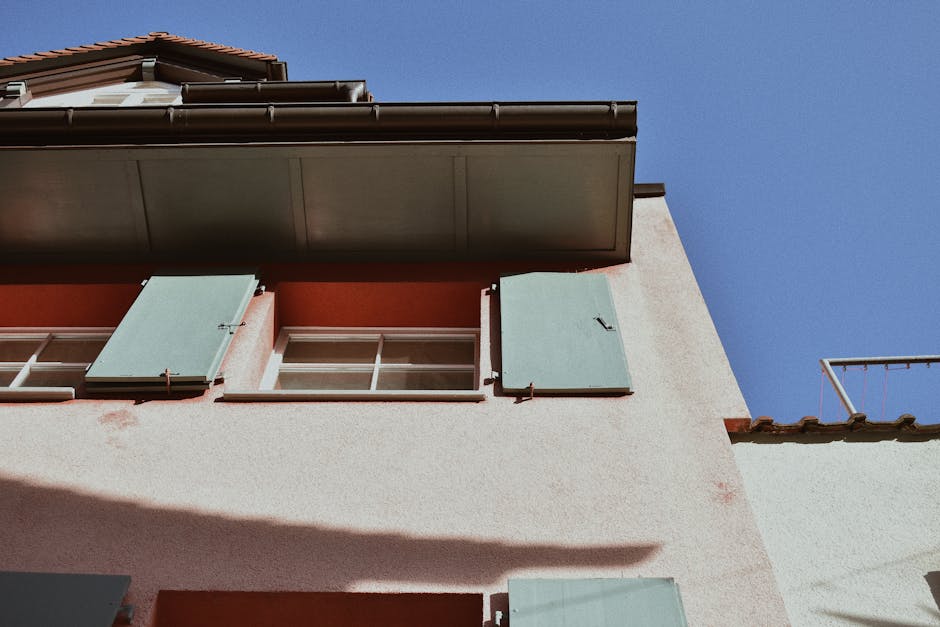 Adelaide Colorbond Quad gutter installation with downpipe by licensed roofer