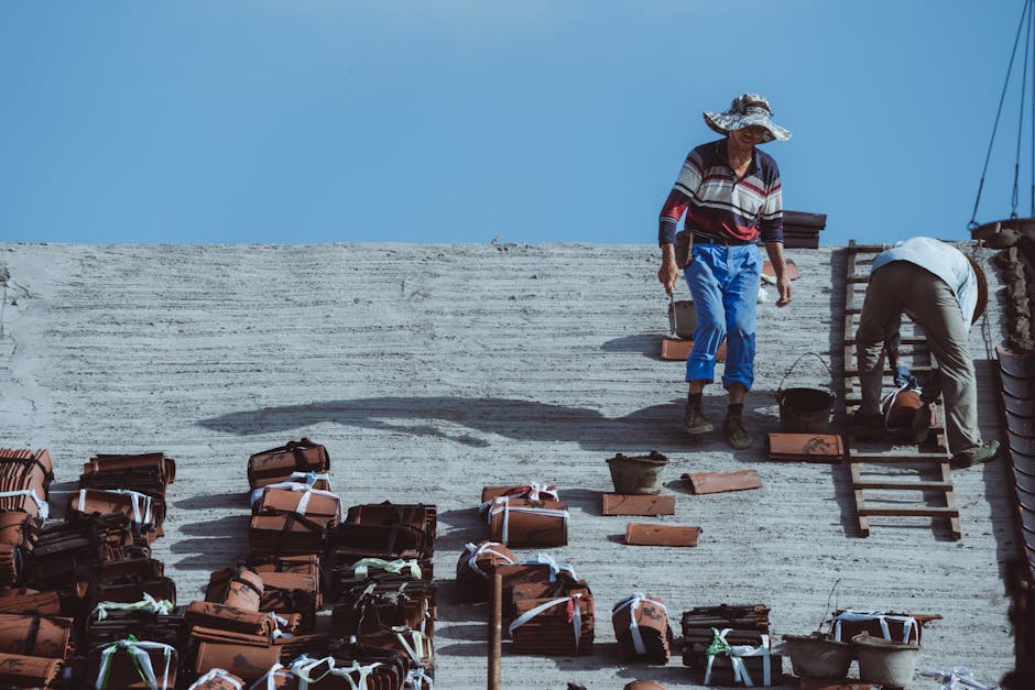 Adelaide roof repair work — licensed roofer rebedding ridge caps on tile roof